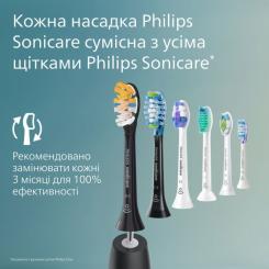 Электрическая зубная щетка Philips HX4021/01 Фото 8